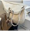 Versión coreana de bolsa tipo dumpling para piel suave 2025 nueva textura gran capacidad simple color sólido transfronterizo comercio exterior bandolera pequeña
