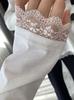 Camiseta de manga larga blanca con cuello redondo y costuras de encaje sueltas de algodón de copo de nieve para otoño e invierno, camisa ajustada con borde cruzado