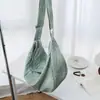 Bolsa de dumplings casual minimalista estilo coreano de gran capacidad, nuevo modelo 2026, bolsa de hombro y cruzada versátil de nicho de alta gama