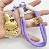 Chaveiro de Ouro Puro 999 Melodia Fofo Criativo Desenho Animado Cordão Corrente para Celular Bolsa Pingente Presente