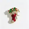Broches transfronterizos con temática navideña, pines festivos de esmalte y con incrustaciones de diamantes, varios diseños de broches navideños, venta al por mayor directa de fábrica