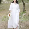 Vestido bordado de escote en V, elegante, de alta gama y adelgazante para vacaciones y ocio, nuevo vestido largo veraniego vintage artístico y fluido