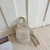 Bolso de Mano de Nuevo Estilo Simple Transfronterizo Bolso de Hombro Cruzado Versátil Casual Bolso de Monedas y Teléfono Estilo Japonés Verano 2026 para Mujer