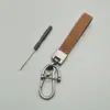 Padrão Embossado Texto Carro Metal Chaveiro Carro Anti-Perda Pingente Chaveiro Joia Argola de Chaveiro Presente Lote