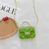 Nova bolsa de gelatina mais vendida transfronteiriça, mini bolsa de mão, bolsa pequena para crianças, bolsa transversal pequena fofa da moda para meninas, porta-moedas