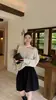 Fábrica de Suéteres Fuente Dalan Suéter estilo coreano de corte holgado adelgazante versátil diseño calado top de punto de cuello halter otoño e invierno para mujer