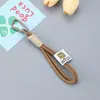 Chaveiro de Corda para Mochila de Exterior Corda Trançada de Nylon Unissex Mosquetão Pingente para Bolsa de Boneca DIY Acessório de Carro Tendência