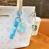 Llavero creativo de aceite de rosa lindo con arena movediza líquida pequeño colgante accesorios para bolso amantes pequeños regalos al por mayor