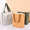Bolsa de papel Dupont con logo personalizado, bolsa de lona vintage, bolsa de hombro de papel kraft lavable para compras, en stock