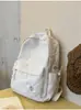 Mochila azul-marinho contrastante estilo americano, legal, estilo faculdade, adequada para estudantes, versátil para ir ao trabalho e uso casual.