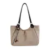 Bolso tote retro de gamuza casual de alta gama para mujer, nuevo 2026, bolso de hombro simple y moderno de gran capacidad