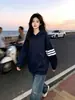 Sudadera con capucha a rayas de manga larga de diseño de nicho moderno estilo coreano para mujer, nuevo top versátil casual de otoño e invierno