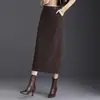 Saia de cor sólida versátil de temperamento, comprimento médio, feminina, novo estilo Outono Inverno 2026, moda, cintura alta, justa ao corpo, cobre os quadris, reta, comprimento médio, moderna