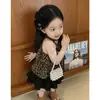 Ropa Infantil Estilo Coreano 2026 Verano Nuevo Conjunto para Niñas Chaleco Elegante con Estampado de Leopardo Falda Negra de Pastel para Niños Conjunto de Dos Piezas