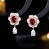 Accesorios Yiwu, pendientes de alta gama con temperamento francés de nicho, venta al por mayor, pendientes de flor con incrustaciones de circón y gota de aceite para mujer