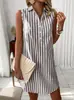 2026 Moda Camisa Listrada Sem Mangas Gola V Botões Casual Minimalista Solta Cruzada Europeia e Americana para Mulheres