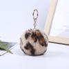 Colgante de Bola de Pelo de Moda 2024 Llavero Pequeño y Lindo en Stock Accesorio al por Mayor Colgante de Dibujos Animados Joyería