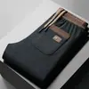 Calças de veludo cotelê grossas de algodão europeu de inverno, largas e casuais, modernas e versáteis, calças atléticas de perna reta, calças compridas masculinas plus size