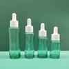 En stock 10 ml 20 ml 30 ml 40 ml Botella de aceite esencial transparente de hombro plano Botella de vidrio Botella de gotero Botella de esencia embotellada