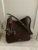 Bolso de Gran Capacidad para Mujer 2025 Nuevo Otoño e Invierno Retro Versátil Bolso Cruzado Diseño de Nicho Bolso Cubo de Hombro para Viajes
