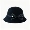 Novo chapéu bucket de lã para mulheres, estilo Hepburn francês outono/inverno, com laço, elegante e versátil, faz o rosto parecer menor, chapéu de pescador