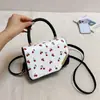 Bolso pequeño cuadrado fresco y dulce para mujer, nuevo bolso de hombro con bloques de color color cereza para verano y otoño 2026, bolso cruzado para el trabajo