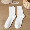 Soporte calcetines de tubo personalizados para dama una variedad de calcetines de felpa de color sólido ins japoneses opcionales fabricantes de calcetines de algodón al por mayor