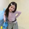 Nova camiseta de manga longa para primavera e outono para meninas, moderna e simples, top casual versátil para bebês meninas
