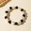 Moda Retro de Halloween Europea y Americana Transfronteriza Pulsera Sencilla de Turquesa Sintética con Calavera y Perlas Elásticas Venta al por Mayor