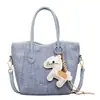 Bolso de Mano Texturizado y Elegante Tipo Cubo para Mujer 2026 Nueva Moda Bolso de Hombro Cruzado para el Trabajo con un Diseño Único y Elegante