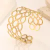 Suministro de Fabricantes Pulseras de Acero Inoxidable de Nuevo Estilo con Apertura Hidráulica Transfronterizas Europeas y Americanas con un Toque de Alta Gama y Diseño Hueco con Patrón Único
