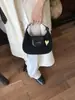 Bolso de Hombro de Moda Versátil para Mujer Bolso de Terciopelo Pan 2026 Otoño Nuevo Bolso de Media Luna de Alta Gama para Viaje Bolso Cruzado