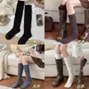Calcetines cálidos de punto grueso retro gris para otoño e invierno para mujer, calcetines holgados de color liso simples con un toque juvenil, calcetines de media pantorrilla