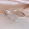 Pulsera Redonda Entrelazada Hueca Transfronteriza Europea y Americana, Pulsera de Declaración Moderna y Única, Joyería de Lujo Ligero de Gama Alta para Mujeres