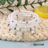 Venta Directa de Fábrica Conjunto de Pulseras de Moda Estilo Étnico Bohemio Colgante Hueco de Palma Cuentas de Arroz Cordón Elástico Joyería