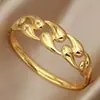 Pulsera trenzada Omaca estilo gota de agua brillante clásica europea y americana, pulsera abierta de acero inoxidable chapado en oro de 18 quilates, a la moda, estilo pareja