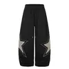 Fornecimento Direto da Fábrica Calça de Moletom com Bordado de Patch de Estrela Xadrez Americano Barra Curva Masculina Feminina Marca Tendência Street Dance Calça de Perna Larga Solta