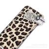 Suministros exclusivos para adultos transfronterizos, cuero sintético con estampado de leopardo y esposas con cerradura, esposas para pies, juguetes alternativos para manos y pies, ataduras de bondage.