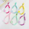 Cadena de Cuentas de Conejito Llavero Colgante Decoración para Bolsa de Auriculares Bluetooth Fresco Pequeño Color Sólido Cuentas Accesorios para Automóvil