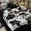 Conjunto de cama minimalista estilo Nantong de quatro peças, adequado para todas as estações, feito de algodão com estampa reativa
