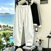 Otoño/Invierno 2026 Nuevo Chenilla Algodón Europeo Espiga Sueltos Pantalones Curvos Hombre Tallas Grandes Rectos de Pierna Ancha