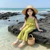 2026 Nuevo Conjunto de Niña Verano Tirantes Finos de Seda de Hielo Vestido con Tirantes Finos Pantalones de Campana de Nueve Puntos Conjunto de Dos Piezas Elegante de Moda
