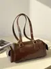 Bolso Femenino de Moda Nuevo Bolso Cilíndrico Versátil de Hombro Único Otoño 2026 Nuevo Bolso de Mano Simple y Elegante para Dama