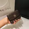 Diseño Nicho Hebilla Estampada Monedero Llavero Mini Exquisito de Alta Gama Bolso Pequeño para Tarjetas Monedero Bolso Todo en Uno