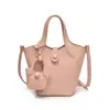 2026 Estilo Coreano Verão Pequeno Nicho Simples Casual Bolsa de Mão Tipo Balde Textura de Alto Padrão Bolsa Transversal de Ombro Bolsa Feminina Tendência