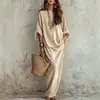 Colección de otoño transfronteriza europea y americana 2026: conjunto de dos piezas para mujer, top casual liso de estilo bohemio y falda larga