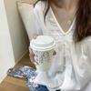 Novo Top Elegante de Nicho da Moda de Estilo Coreano para Início de Outono, Design Chic de Estilo Francês, Camisa Clavicular de Estilo Hong Kong para Mulheres
