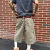 Shorts Casuais de Trabalho da Marca Trendy Scoundrel de Rua Americano com Múltiplos Bolsos para Homens Verão Soltos de Comprimento Médio Calças Trendy de Cinco Pontos