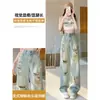 Calça jeans rasgada estilo americano para mulheres, estilo fino de verão 2026, com aspecto desgastado, desfiada, relaxada, casual, calça de perna larga reta desgastada
