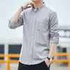 Camisa branca de manga longa em tecido Oxford para homens, estilo primavera e outono, resistente a rugas, espessada, camisa casual preta, top de outer wear de outono